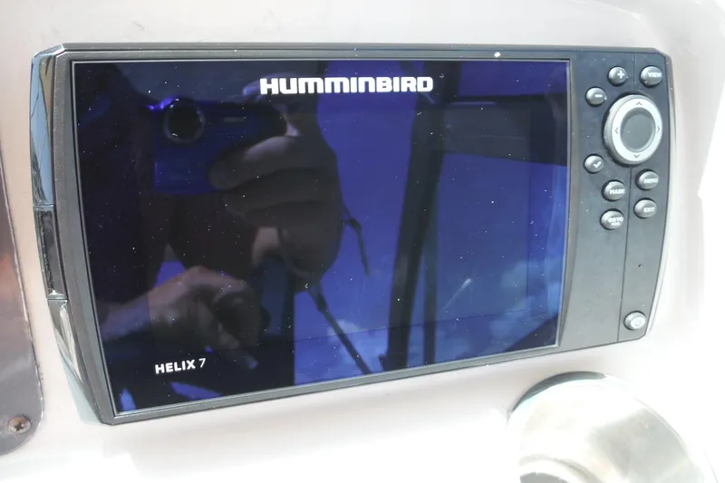 Slide: The Image of Humminbird Helix 7 fish finder on 2007 Robalo R227 Dual Console boat. - 10