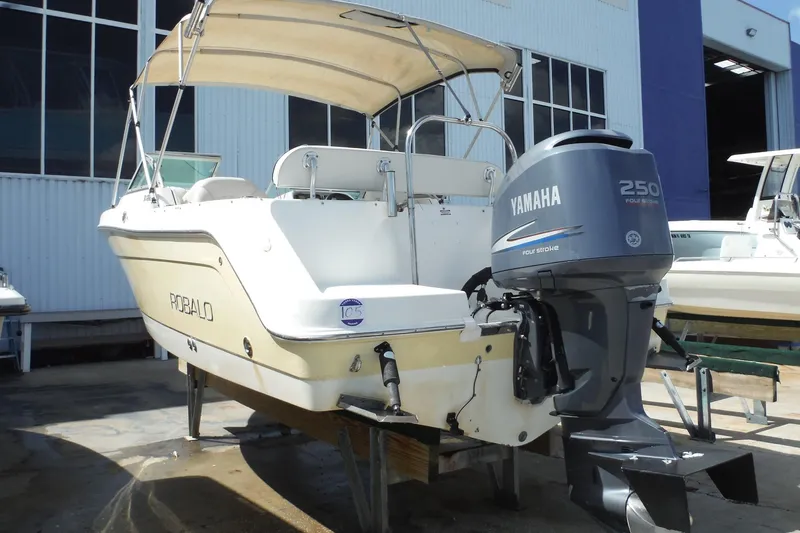 Slide: The Image of 2007 Robalo R227 Dual Console boat with Yamaha 250 engine, docked outdoors. - 3