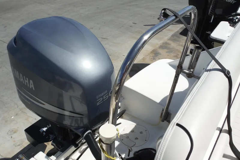Slide: The Image of 2007 Robalo R227 Dual Console with Yamaha 250 outboard motor, docked. - 34
