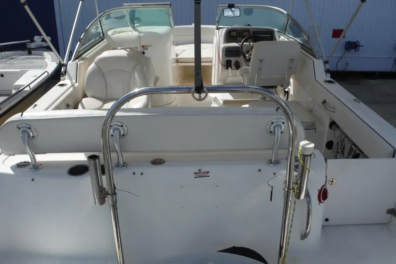 Slide: The Image of 2007 Robalo R227 Dual Console boat interior with seating and steering console. - 5