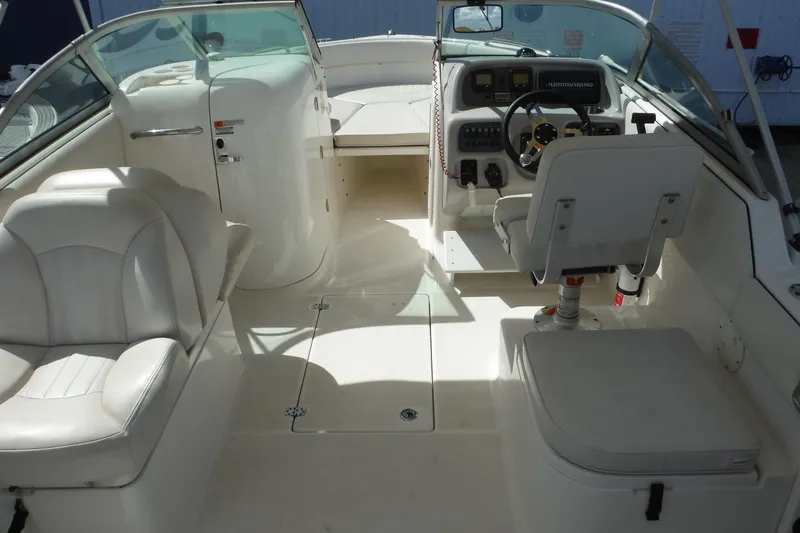 Slide: The Image of 2007 Robalo R227 Dual Console boat interior with steering wheel and seating. - 6