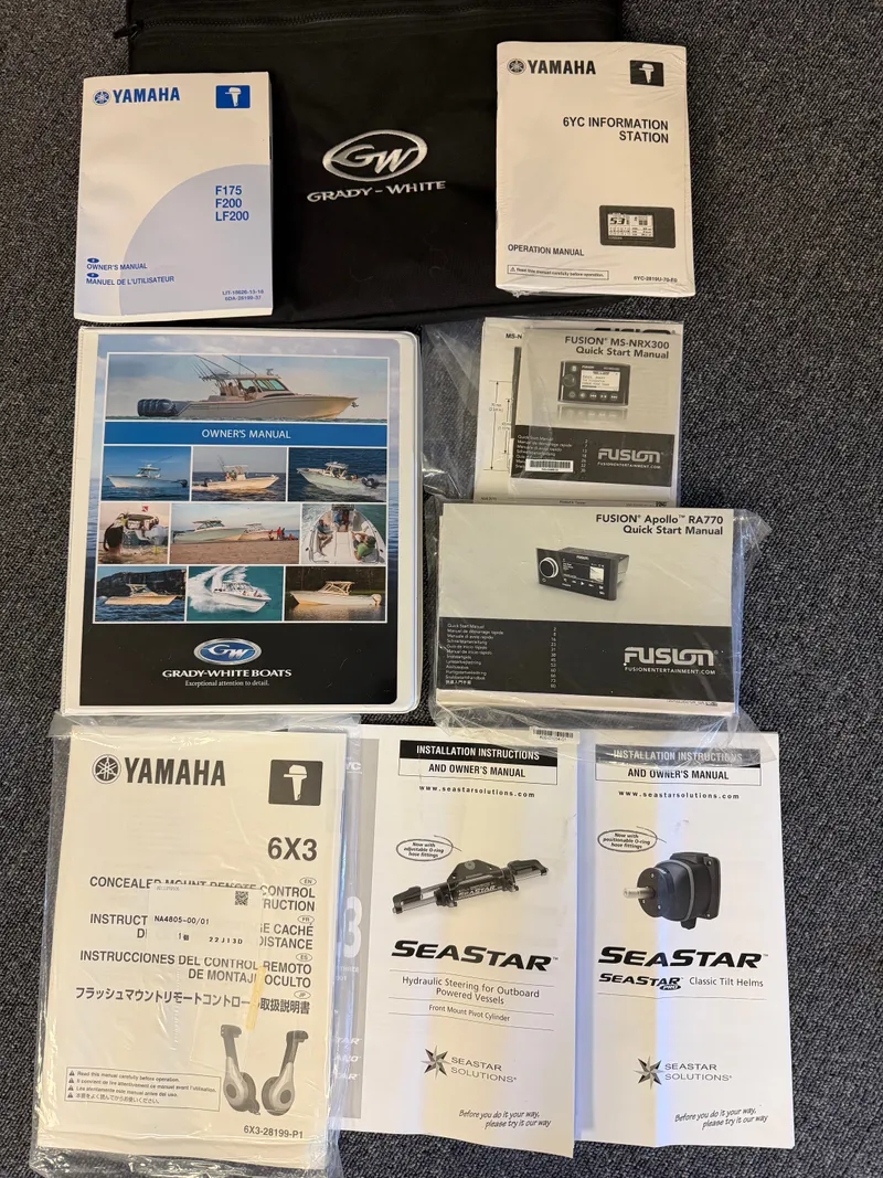 Slide: The Image of Manuals for Grady-White Freedom 215 boat, Yamaha and Fusion equipment. - 14