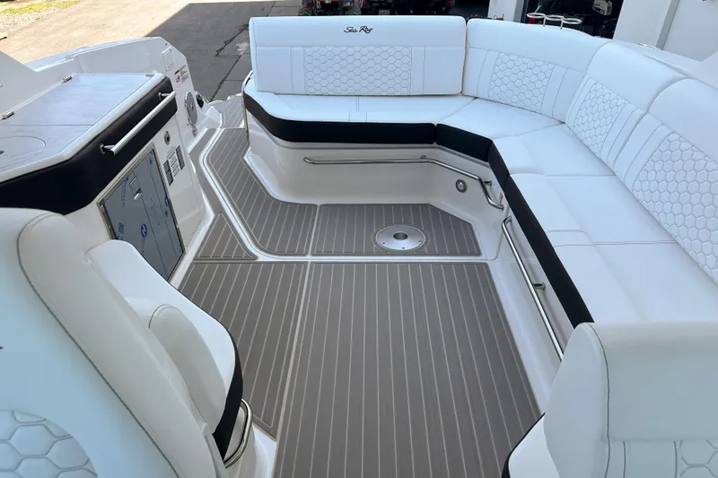 Slide: The Image of Manufacturer Provided Image: 2025 Sea Ray Sundancer 320 cruising on a serene lake at sunset. - 42