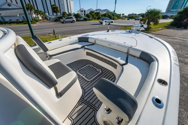 Slide: The Image of 2020 Tidewater 2500 Carolina Bay boat interior with seating and deck details. - 14