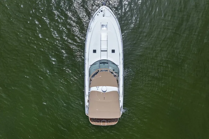 Slide: The Image of Overhead view of 2001 Sea Ray 380 Sundancer yacht on calm water. - 3