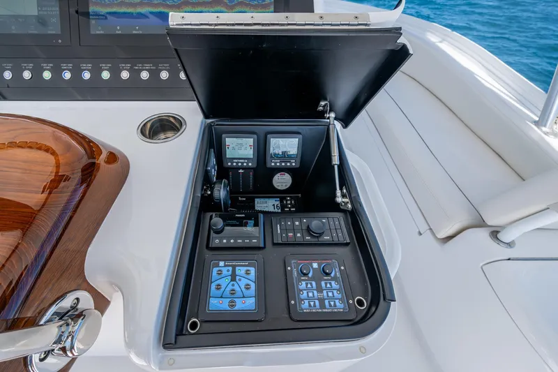 Slide: The Image of Viking yacht control panel with advanced navigation and communication systems, open on deck. - 13