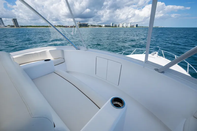 Slide: The Image of Luxurious Viking boat interior with ocean view and city skyline in the background. - 17
