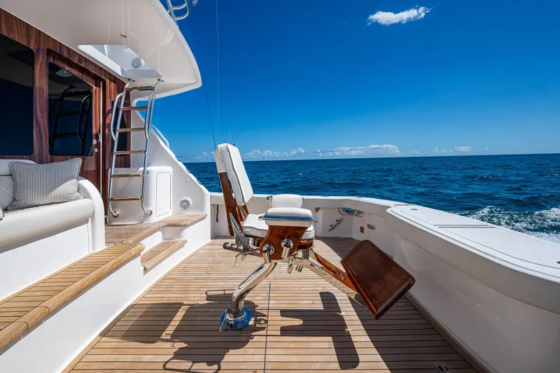 Slide: The Image of Luxurious Viking yacht deck with fishing chair, ocean view, and clear blue sky. - 25