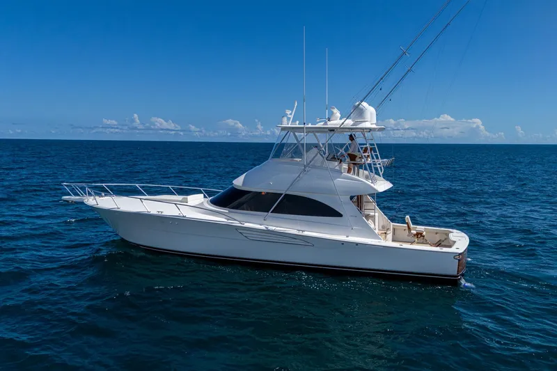 Slide: The Image of Viking yacht cruising on open ocean under clear blue sky. - 3