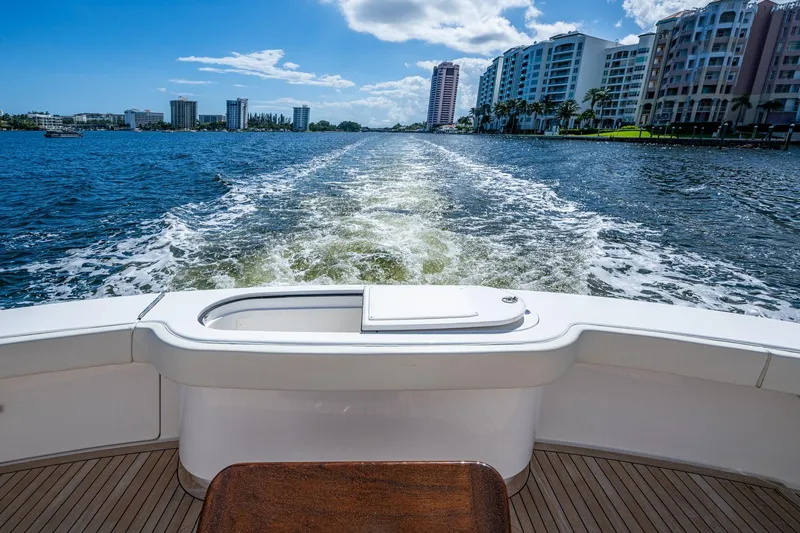 Slide: The Image of View from a Viking yacht, overlooking a wake trail on a sunny day. - 30