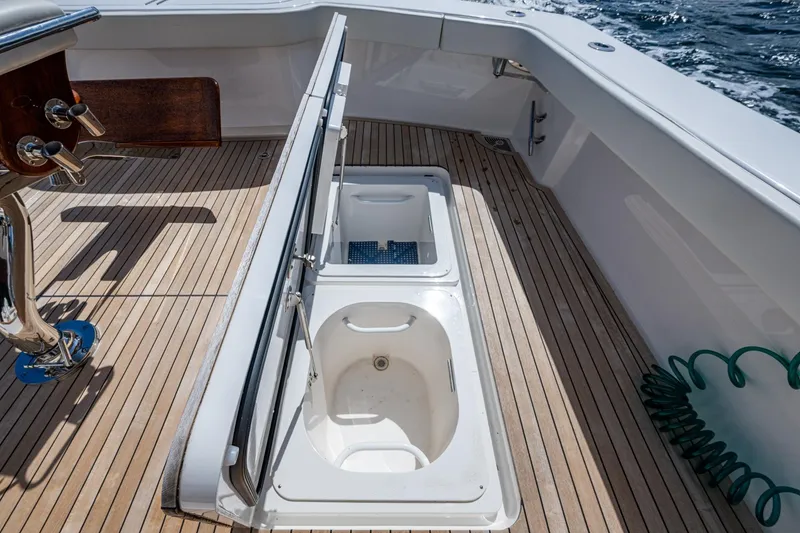 Slide: The Image of Open storage compartments on a Viking boat deck with wooden flooring. - 34