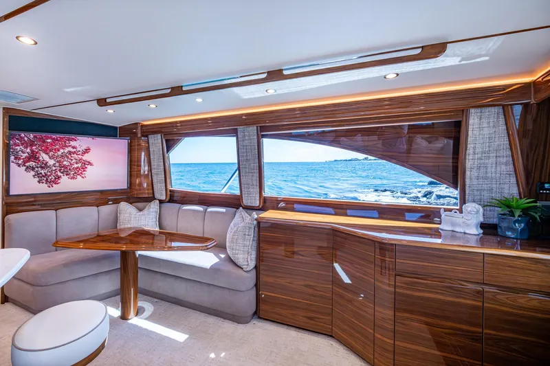 Slide: The Image of Luxurious Viking yacht interior with ocean view, featuring elegant wood finishes and comfortable seating. - 40
