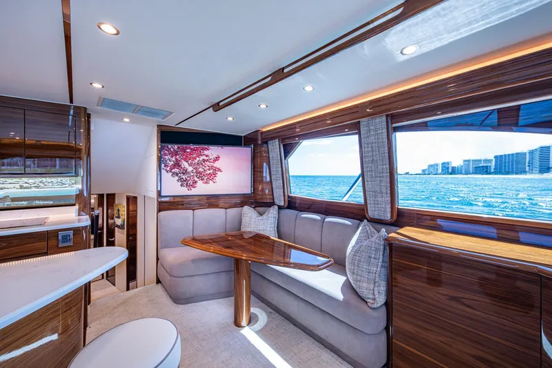 Slide: The Image of Luxurious Viking yacht interior with elegant wood finishes and ocean view through large windows. - 41