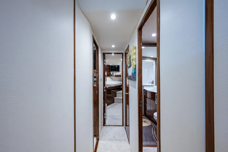 Slide: The Image of Hallway inside a Viking yacht with wooden doors and modern lighting. - 46