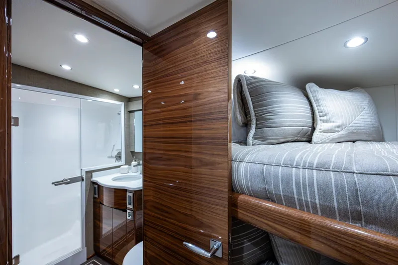Slide: The Image of Luxurious Viking yacht interior with cozy bunk bed and modern bathroom. - 50