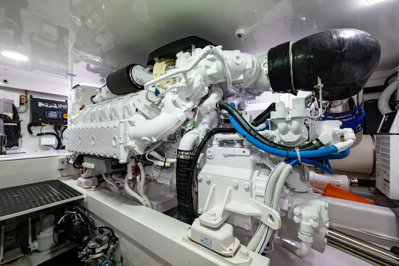 Slide: The Image of Engine room featuring a Viking marine engine with complex piping and components. - 58
