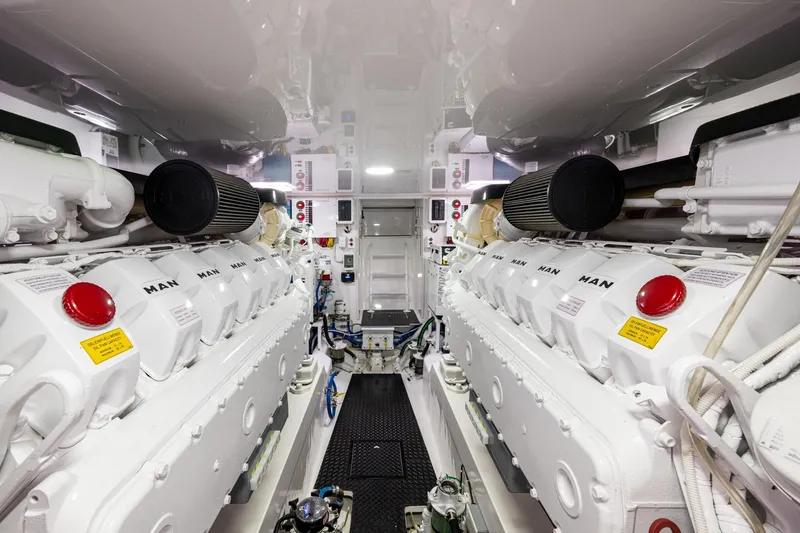 Slide: The Image of Engine room of a Viking vessel featuring dual MAN engines, showcasing advanced marine engineering. - 62