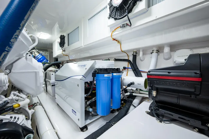 Slide: The Image of Engine room of a Viking boat featuring advanced filtration and cooling systems. - 65