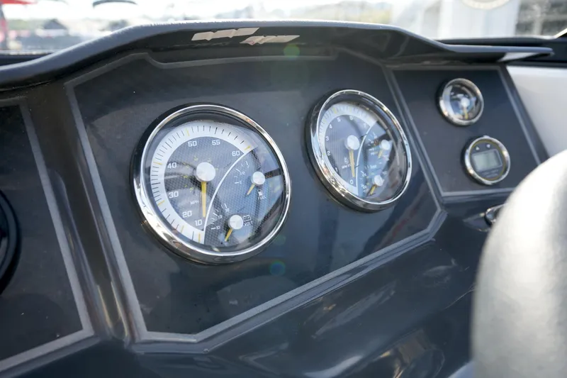 Slide: The Image of Dashboard of 2023 Bayliner VR5 Bowrider I/O with speedometer and gauges. - 14