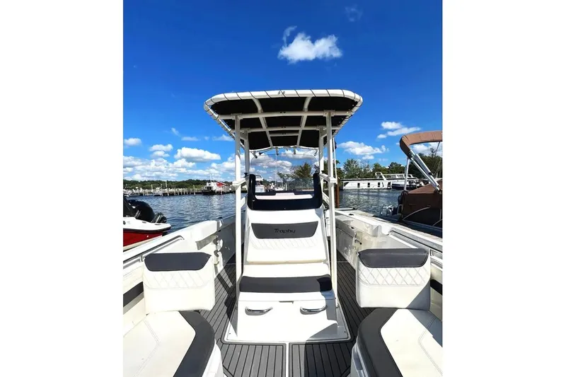 Slide: The Image of 2023 Bayliner Trophy T22CC boat on a sunny day at the marina. - 23