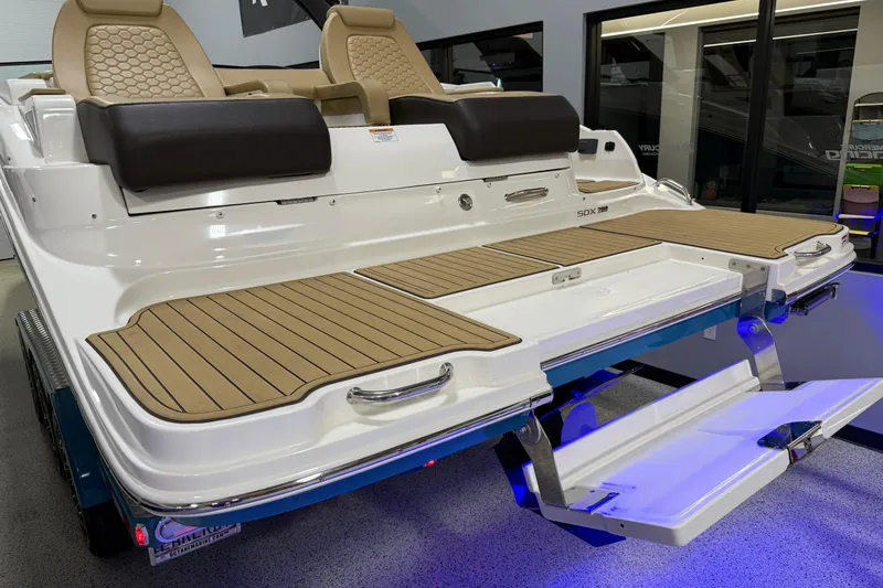 Slide: The Image of 2023 Sea Ray SDX 290 boat with teak swim platform and seating. - 9