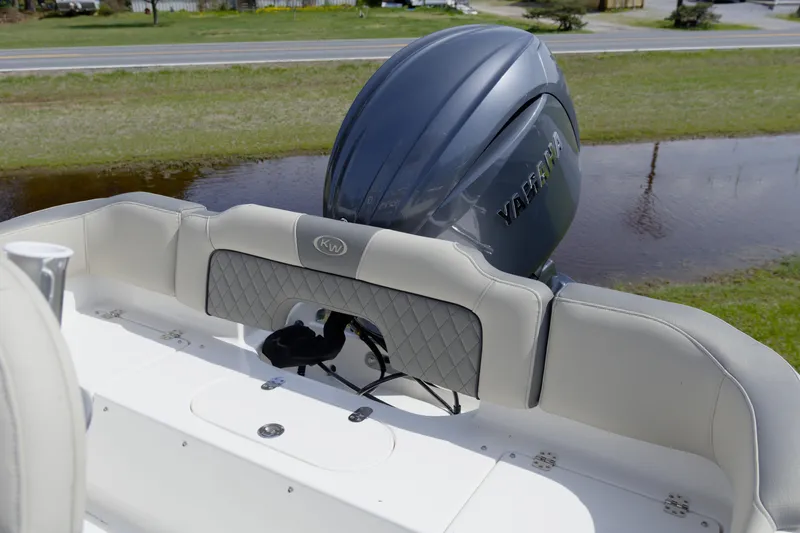 Slide: The Image of 2026 Key West 203 FS boat with Yamaha engine, featuring cushioned seating and sleek design. - 16