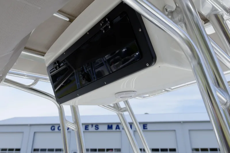 Slide: The Image of 2026 Key West 203 FS boat console with stainless steel frame and electronics enclosure. - 20
