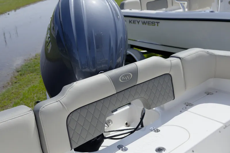 Slide: The Image of 2026 Key West 203 FS boat with Yamaha engine, featuring sleek design and comfortable seating. - 22