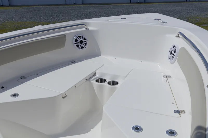 Slide: The Image of Interior view of 2026 Key West 203 FS boat, featuring seating and cup holders. - 23