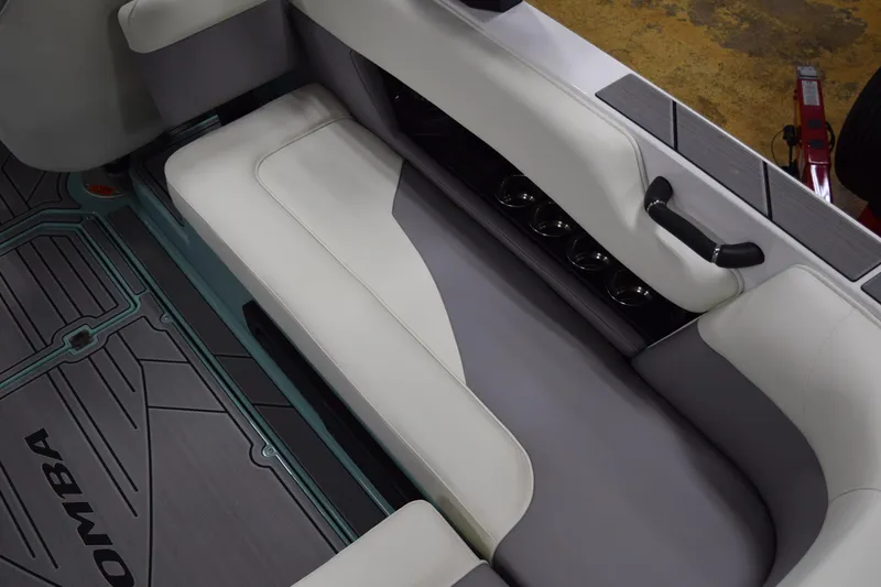 Slide: The Image of 2025 Moomba Mojo boat interior with sleek seating and cup holders. - 10