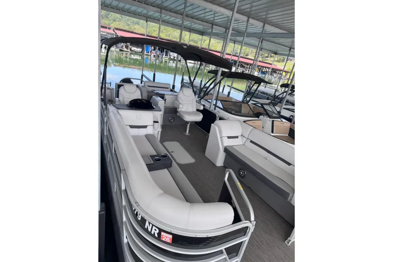 Slide: The Image of 2023 Godfrey SWEETWATER 2486 DT pontoon boat with spacious seating and modern design. - 1