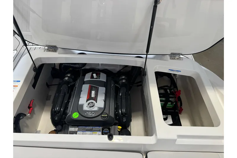 Slide: The Image of Engine compartment of a 2026 Sea Ray SPX 210 boat, showcasing the powerful engine. - 22