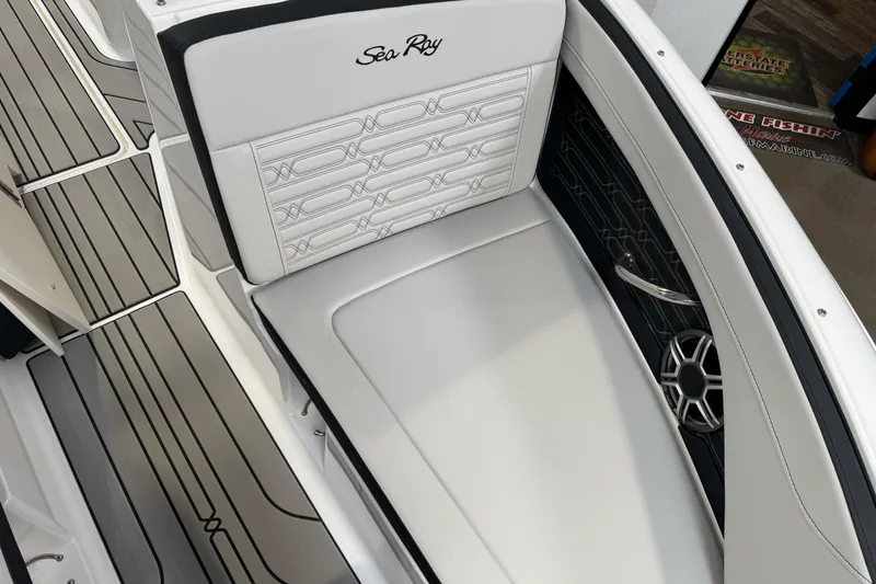 Slide: The Image of 2026 Sea Ray SPX 210 boat interior with white seating and stylish design. - 31
