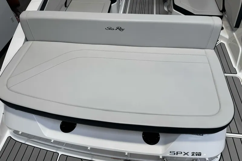 Slide: The Image of 2026 Sea Ray SPX 210 boat with sleek seating and modern design. - 9