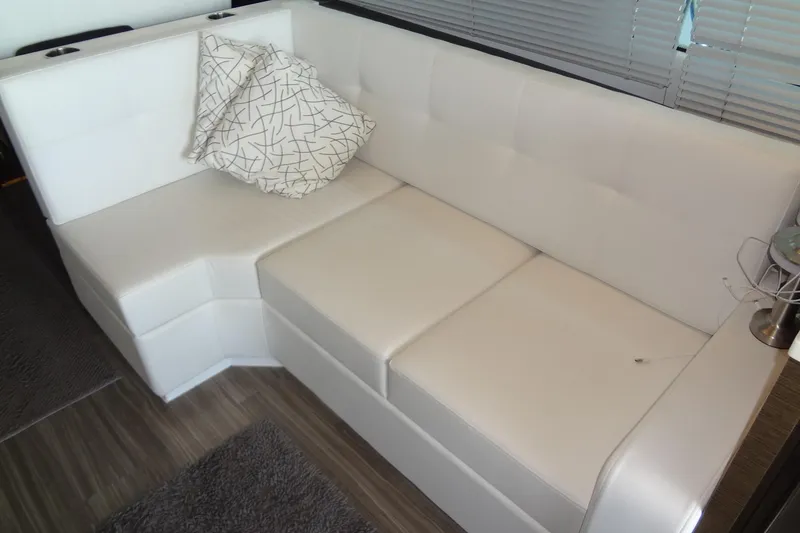 Slide: The Image of Luxurious white leather seating in 2021 Cruisers Yachts 50 Cantius interior. - 20