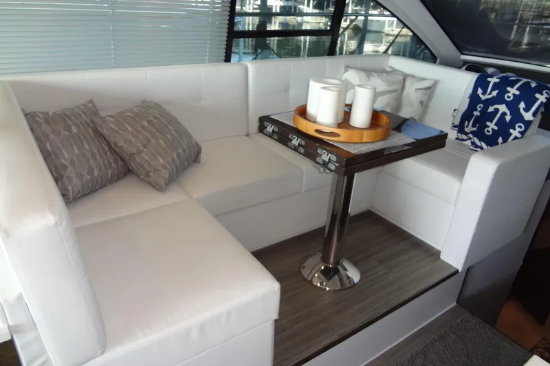 Slide: The Image of Luxurious interior of 2021 Cruisers Yachts 50 Cantius with elegant seating and decor. - 22