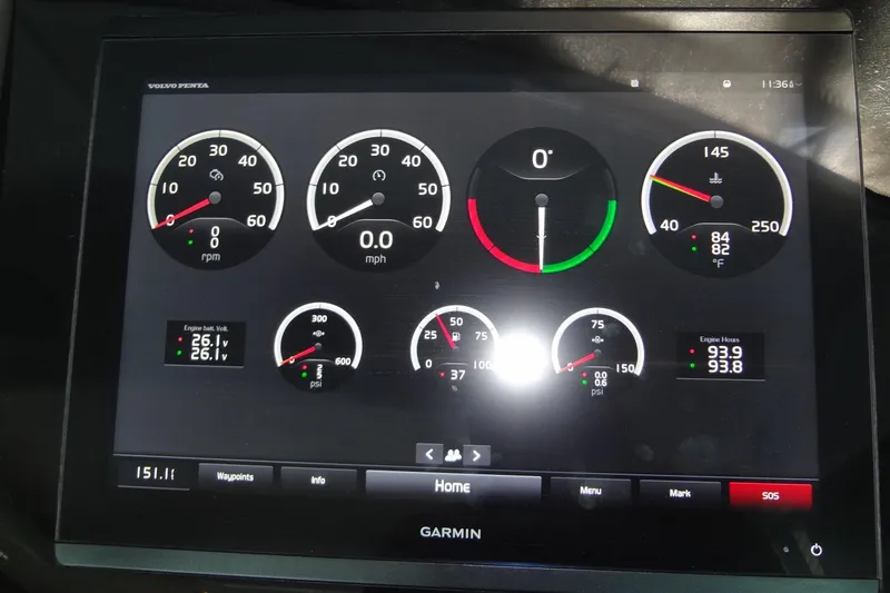 Slide: The Image of Dashboard display of 2021 Cruisers Yachts 50 Cantius with engine metrics and navigation data. - 31