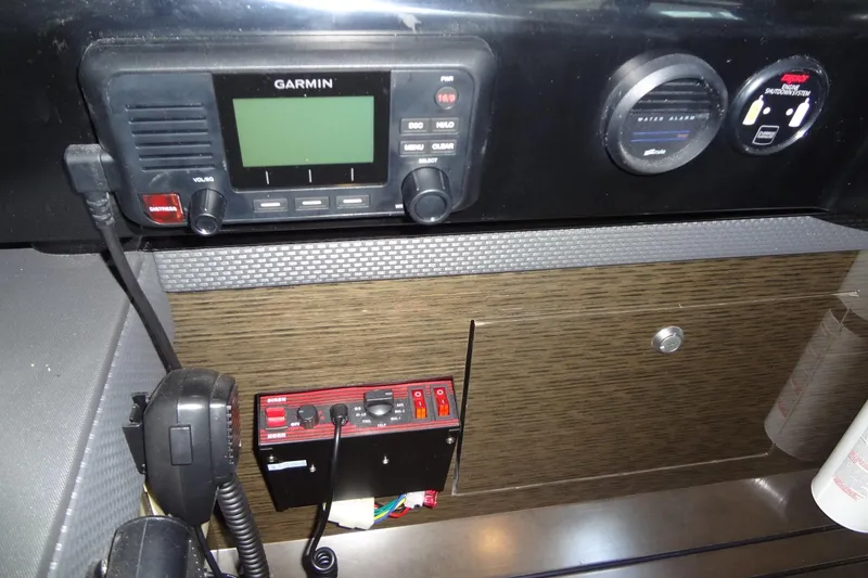 Slide: The Image of 2021 Cruisers Yachts 50 Cantius dashboard with Garmin marine electronics. - 32