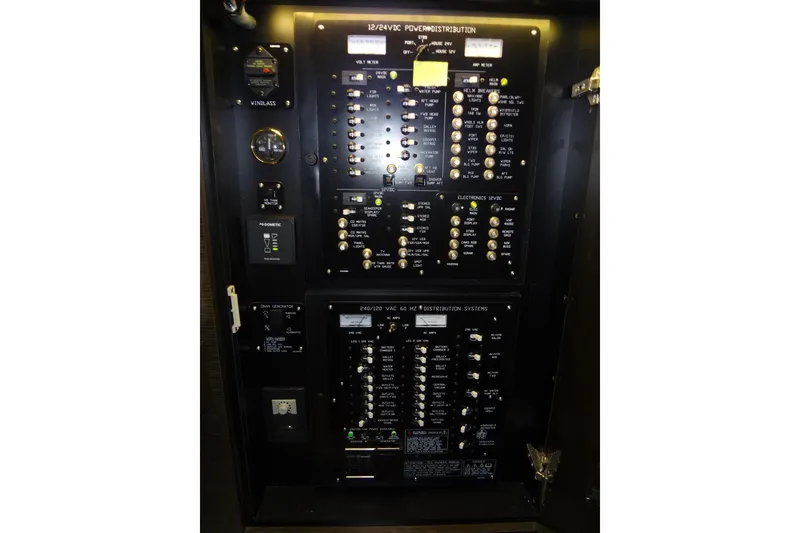 Slide: The Image of Electrical control panel on a 2021 Cruisers Yachts 50 Cantius boat. - 40