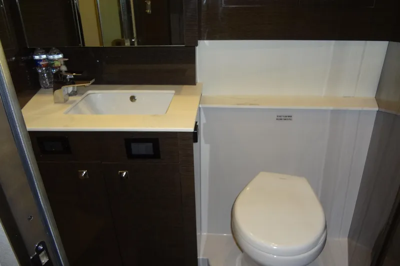 Slide: The Image of 2021 Cruisers Yachts 50 Cantius bathroom with sink and toilet, modern design. - 45