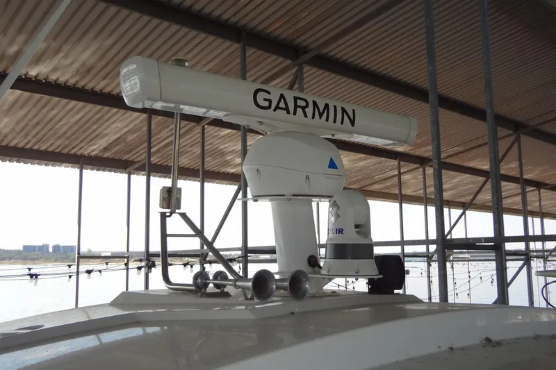 Slide: The Image of 2021 Cruisers Yachts 50 Cantius with Garmin radar and FLIR camera under a dock. - 53