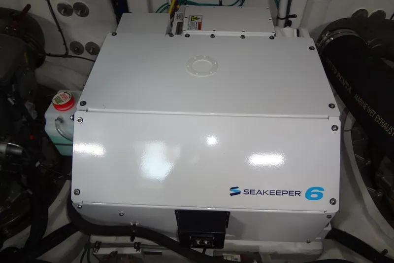 Slide: The Image of Seakeeper 6 stabilizer in 2021 Cruisers Yachts 50 Cantius engine room. - 58