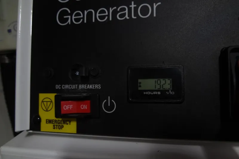 Slide: The Image of Generator control panel with hour meter reading 192.3 on a 2021 Cruisers Yachts 50 Cantius. - 59