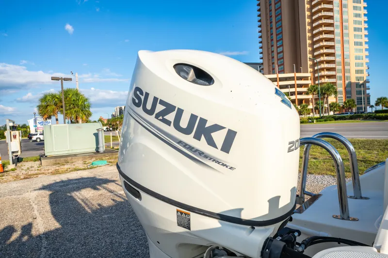 Slide: The Image of 2019 Bulls Bay 200 CC with Suzuki outboard motor in urban setting. - 11