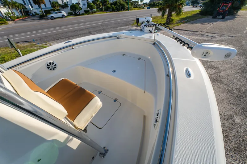 Slide: The Image of 2019 Bulls Bay 200 CC boat interior with seating and trolling motor. - 13