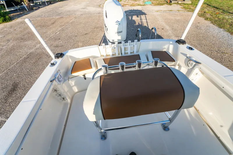 Slide: The Image of 2019 Bulls Bay 200 CC boat interior with seating and rod holders. - 22