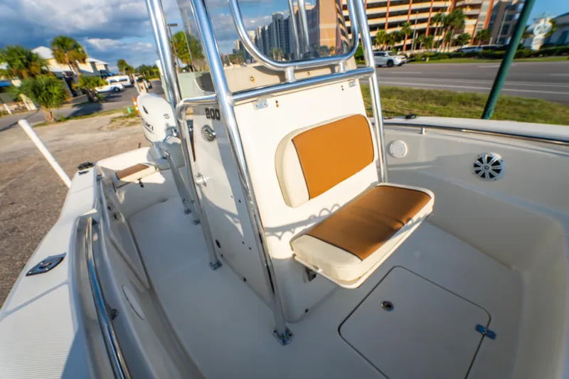 Slide: The Image of 2019 Bulls Bay 200 CC boat interior with cushioned seating and stainless steel railings. - 27
