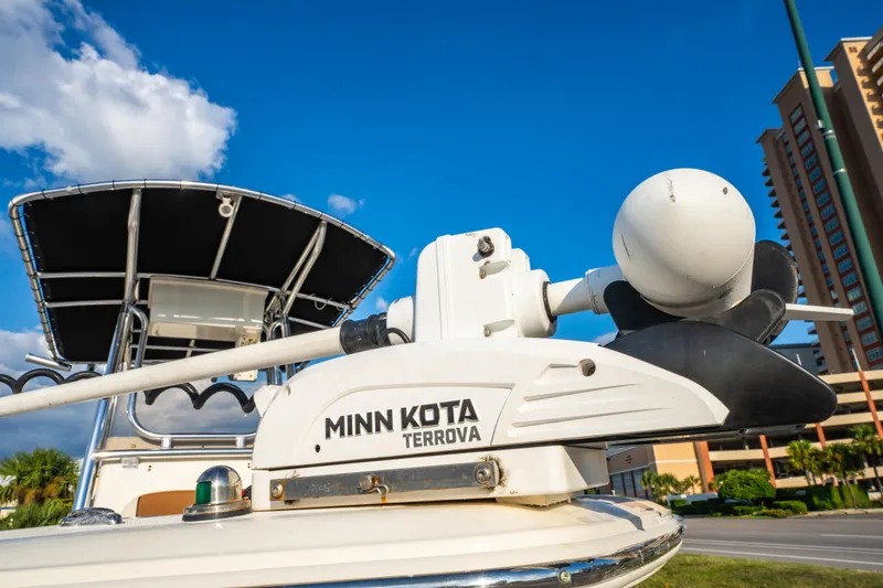 Slide: The Image of 2019 Bulls Bay 200 CC boat with Minn Kota Terrova motor under clear blue sky. - 28