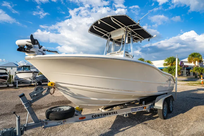 Slide: The Image of 2019 Bulls Bay 200 CC boat on trailer under blue sky. - 3