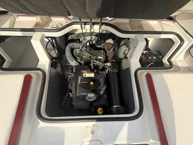 Slide: The Image of Engine compartment of a 2021 Scarab 195 ID boat with Rotax engine. - 3